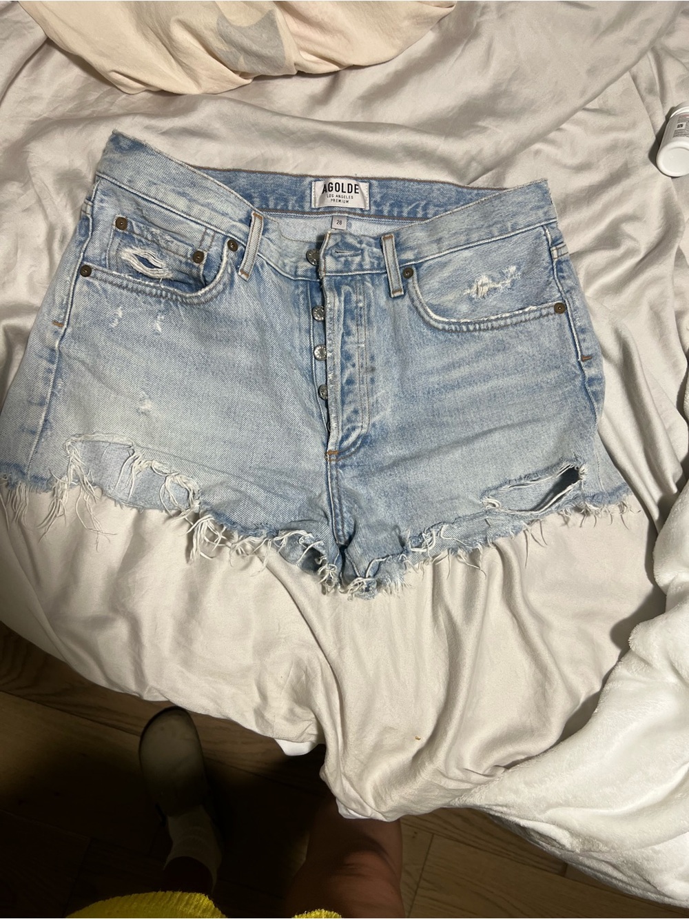 Agolde Faded Light Blue Distressed Denim Cutoff Shorts